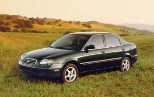 Suzuki Esteem Седан 03.1996 - 11.2001